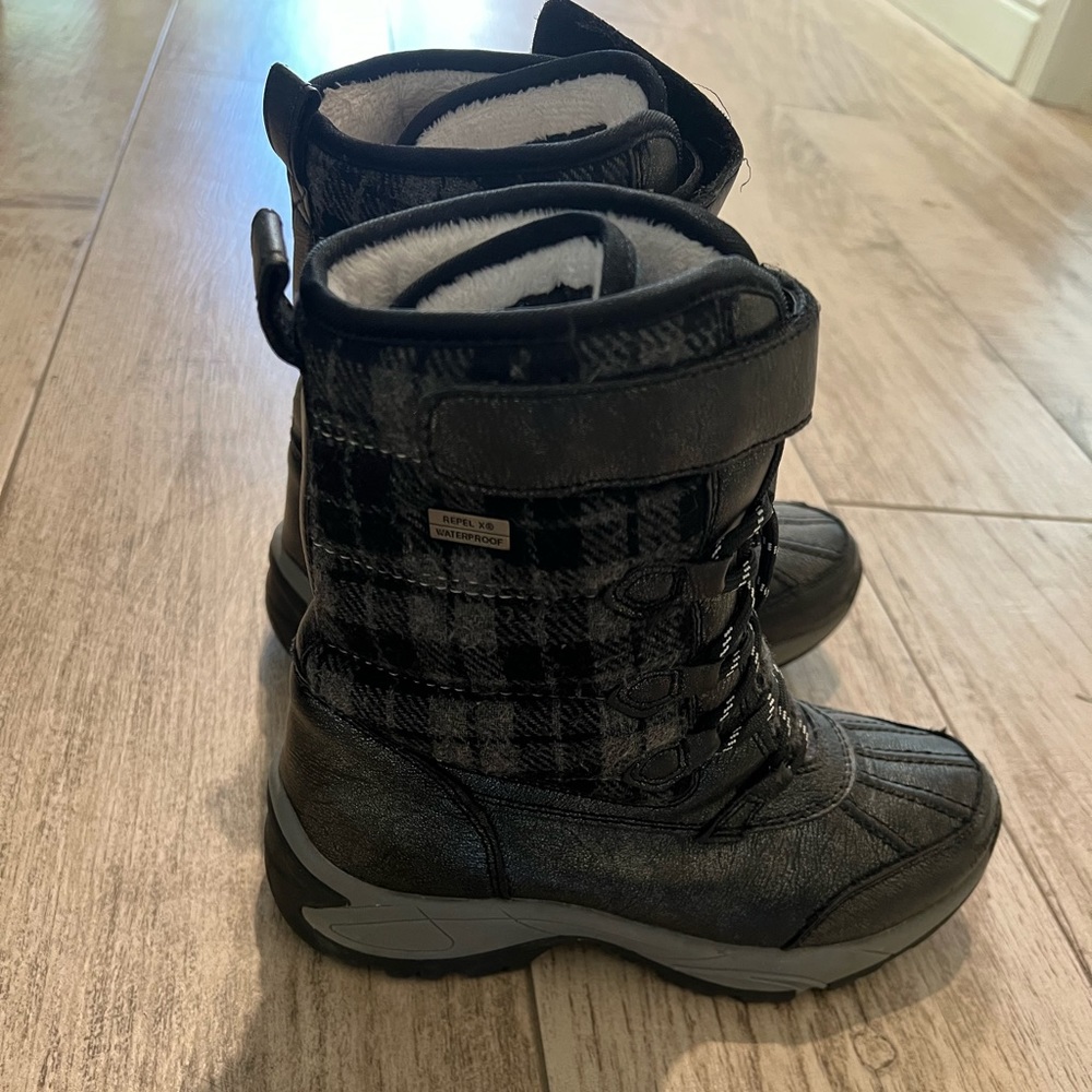 Kids Kodiac Waterproof rain boots for kids in a gender neutral color/pattern.